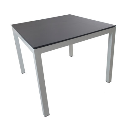 Jug Dining Table Frame Finish: Espresso, Top Finish: Black