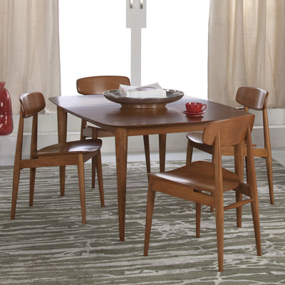 Cona Dining Table Finish: Walnut, Table Top: Strata Top