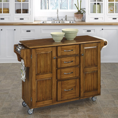 Adelle-a-Cart Kitchen Island Finish: Warm Oak