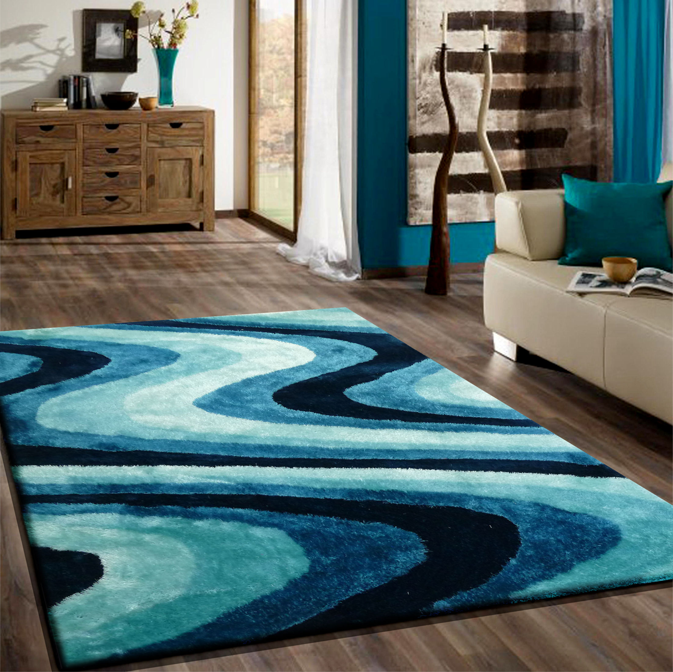 Quijada Hand-Tufted Turquoise Area Rug
