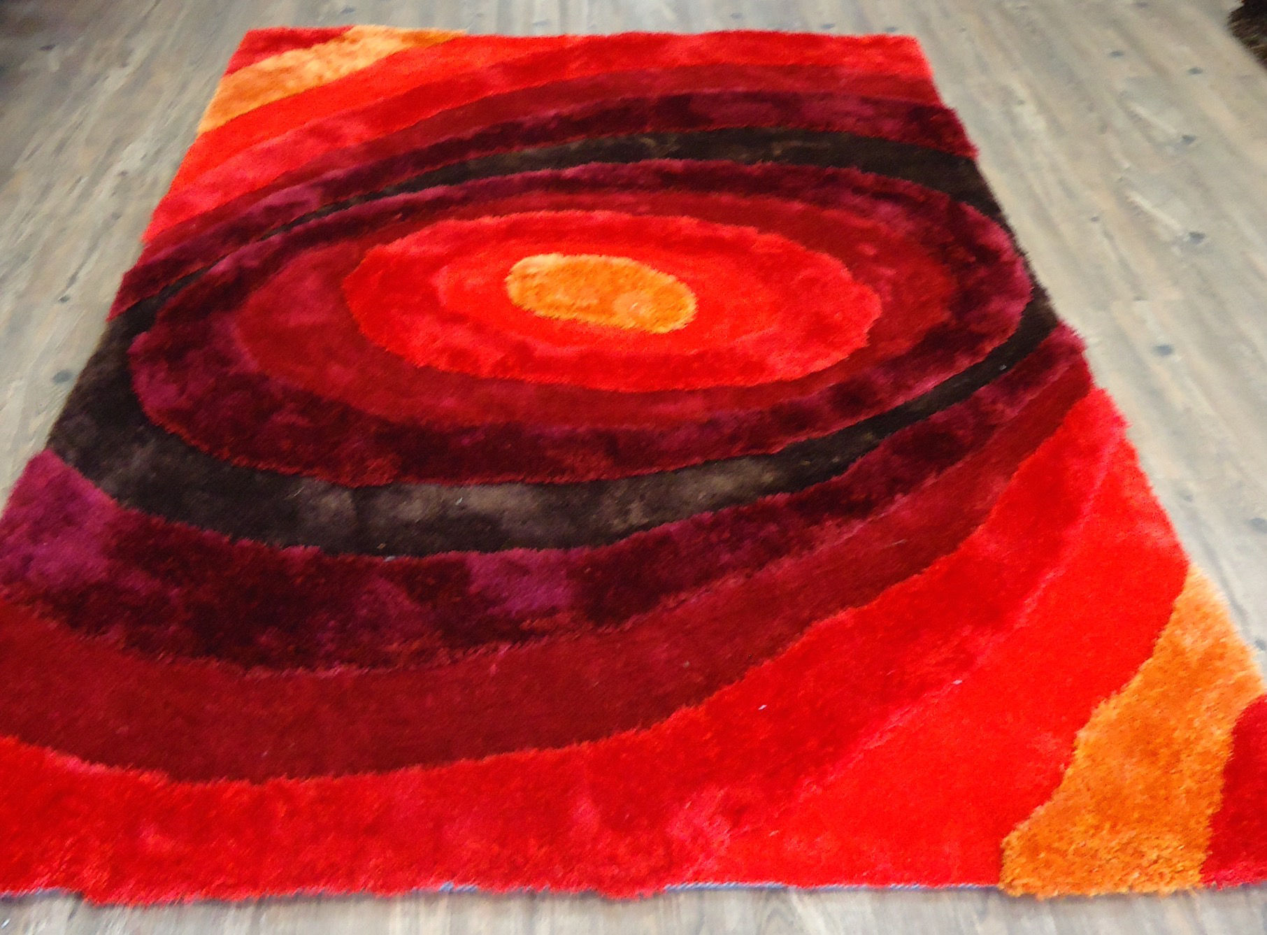Qualls Hand-Tufted Red Area Rug