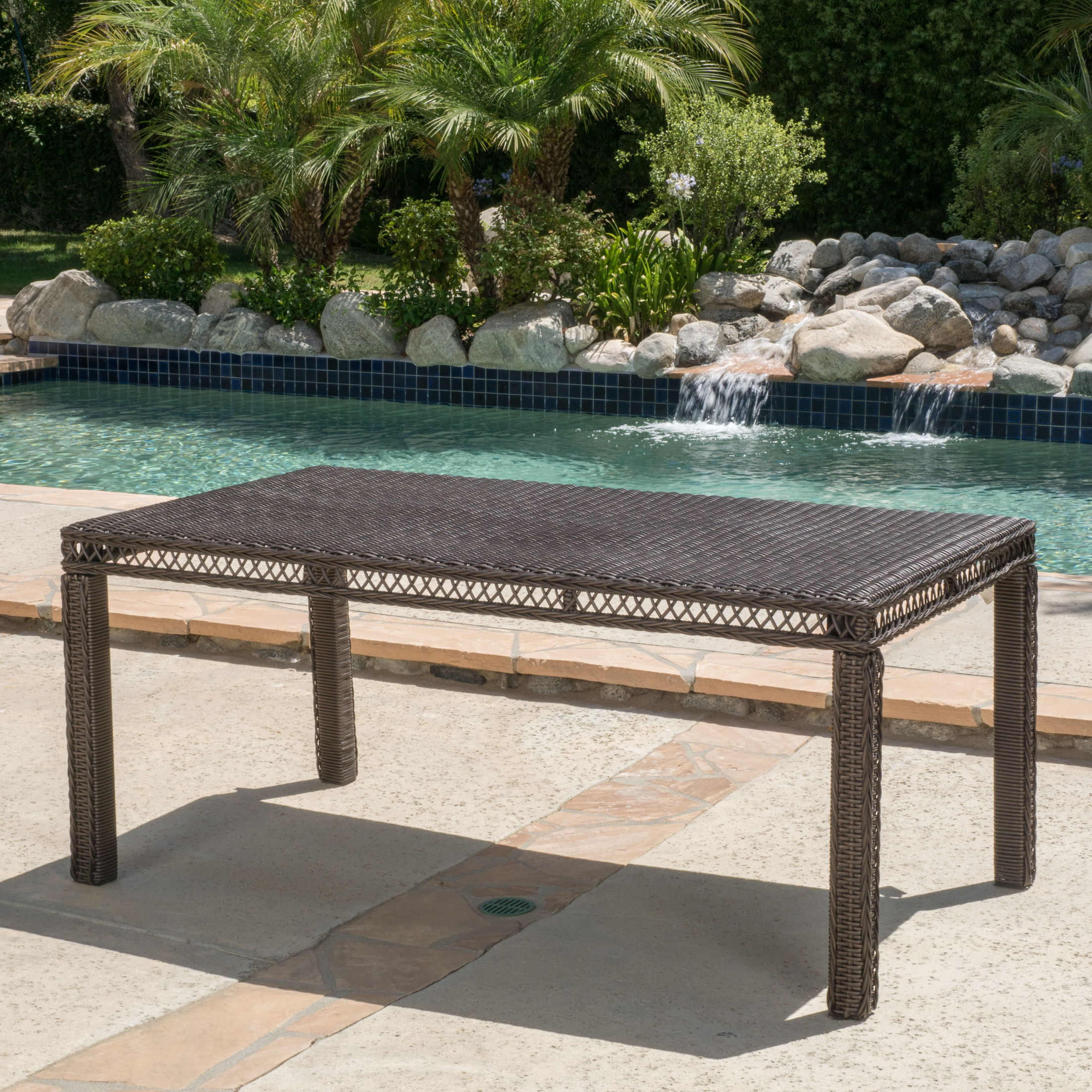 Patio Tables Enigma Outdoor Dining Table Made from sturdy polyethylene wicker and an iron frame, this large table will be perfect for your outdoor gatherings. Features: -Contemporary style.-Material: PE wicker and iron.-Outdoor use.-Product Type: Dining Table.-Outer Frame Material: Metal -Ou...
